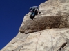 Ed leading headstone rock in Joshua Tree